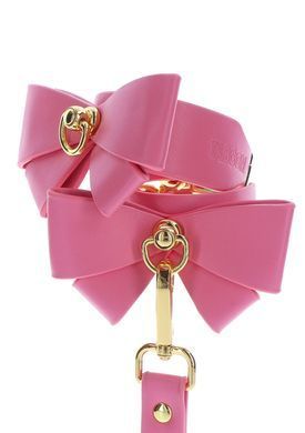 Наручники з бантиками Taboom Malibu Wrist Cuffs із веганської шкіри, рожеві